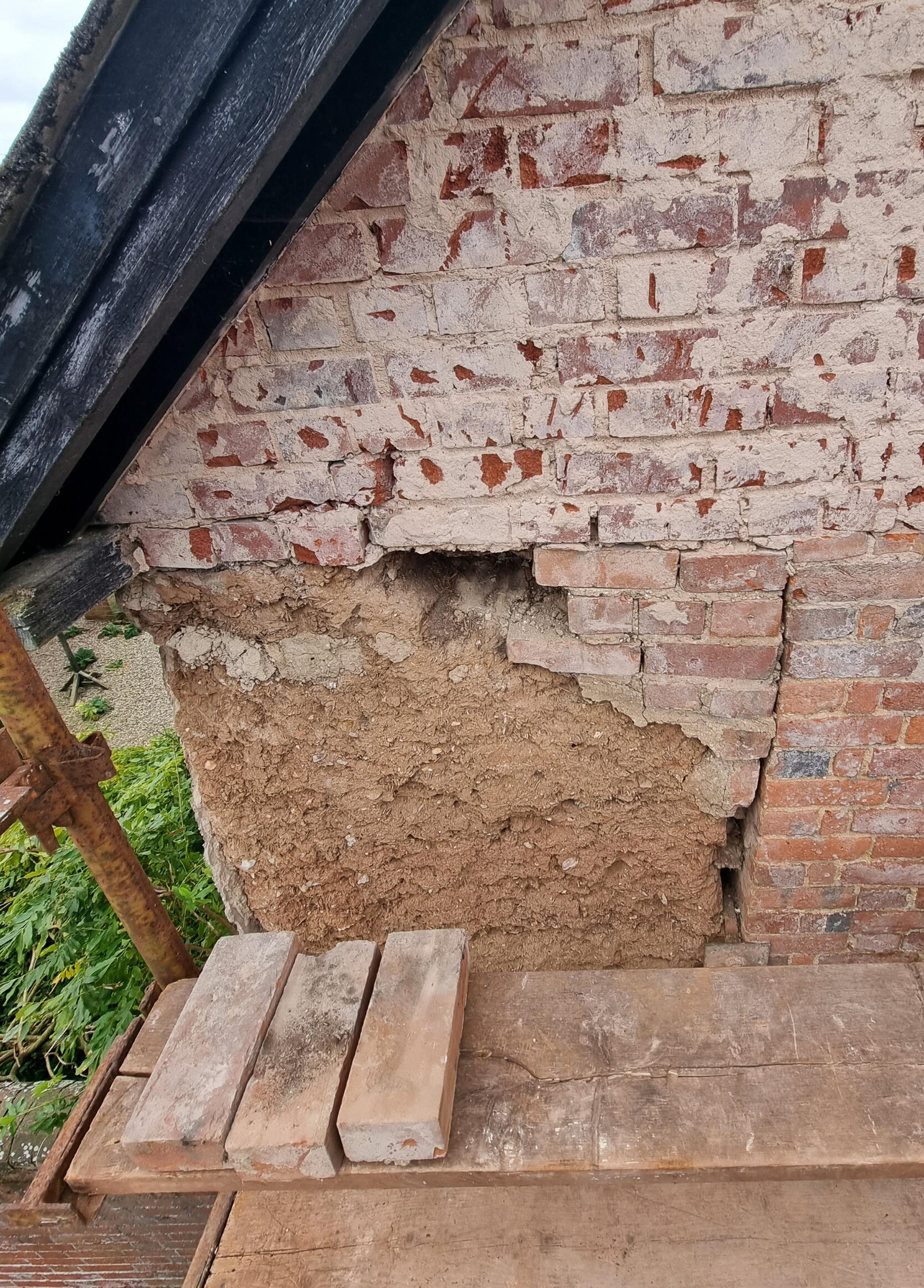 Failed brick repairs - left flank.